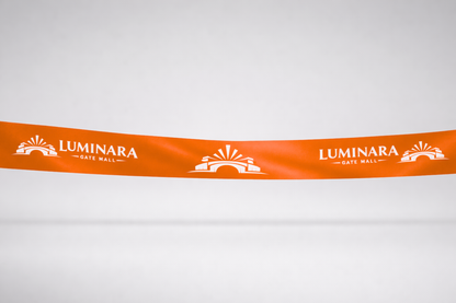Ruban d'inauguration en satin ECO orange avec impression personnalisée de JM Band®.