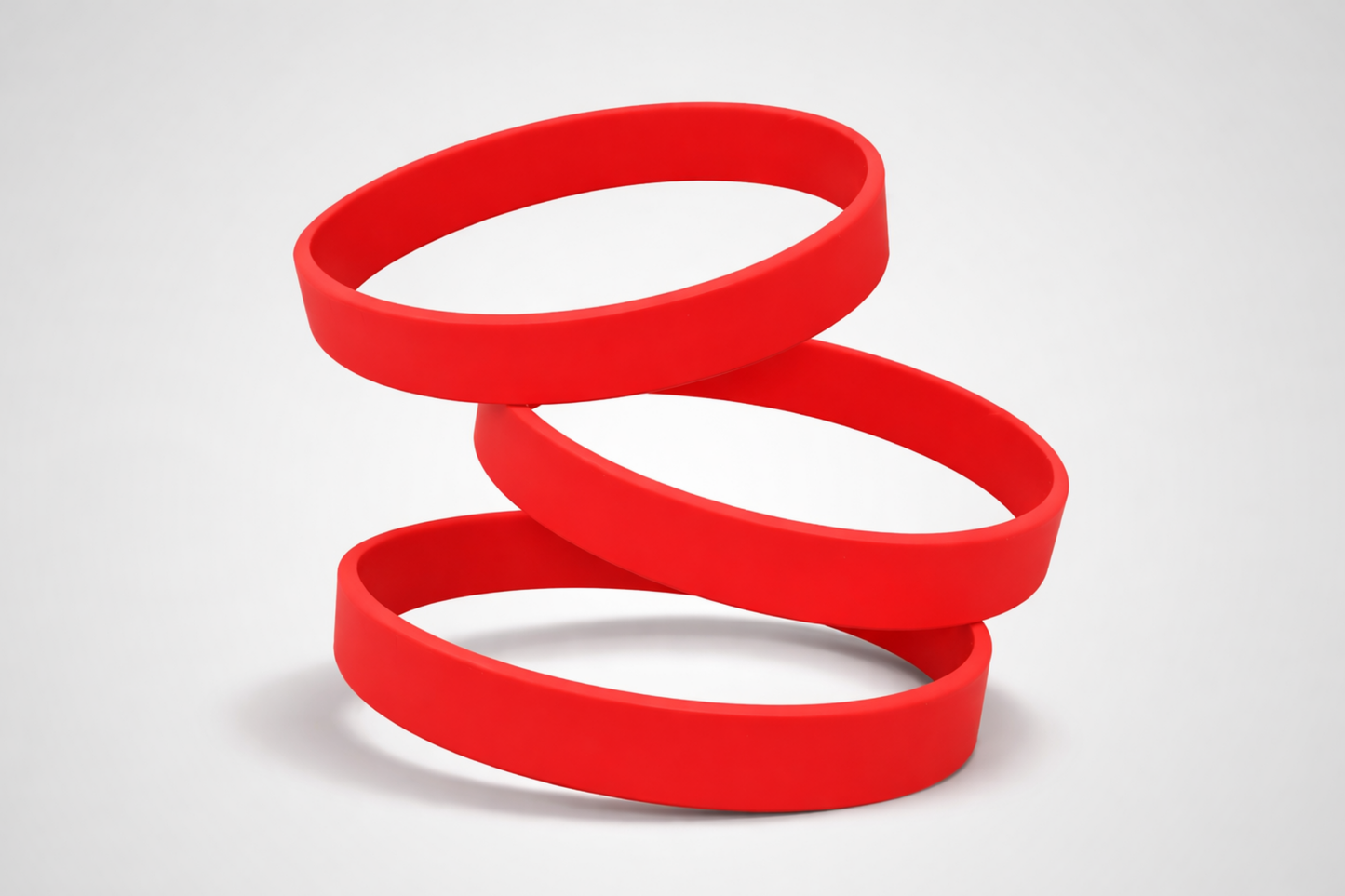 Bracelets en silicone rouge uni. Achetez des bracelets en silicone sans impression chez JM Band®.